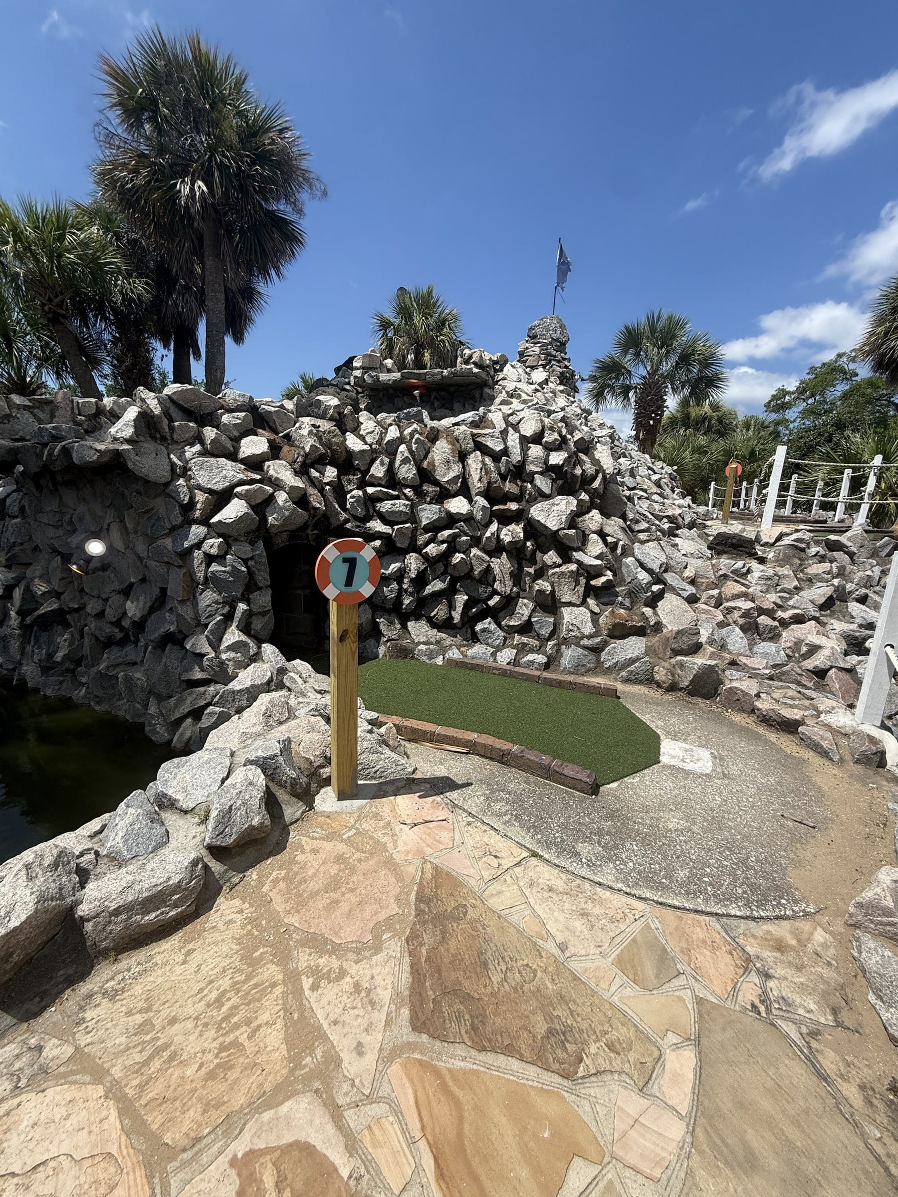 Rock tunnel challenge at hole 7 of Captain Myrtle Mini Golf